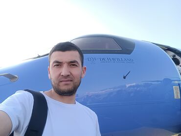 талас терек: Синий самолет с надписью "D.H. DE HAVILLAND AIRCRAFT OF CANADA" на
