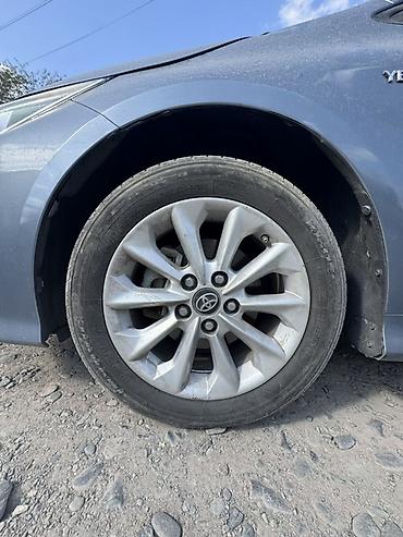 byd e1: Toyota Corolla: 2021 г., 1.8 л, Вариатор, Гибрид, Седан — 5