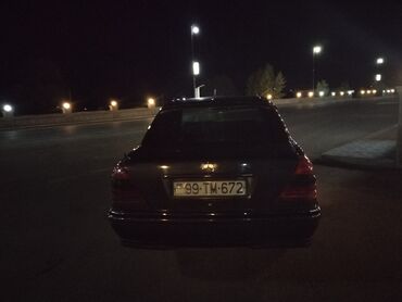 mercedes dört göz: Mercedes-Benz 200: 2.5 l | 1993 il Sedan