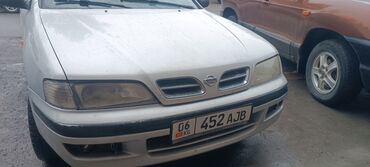 купить диски r16 4x114.3: Nissan Primera в кузове универсал, окрашенный в светло-серый цвет