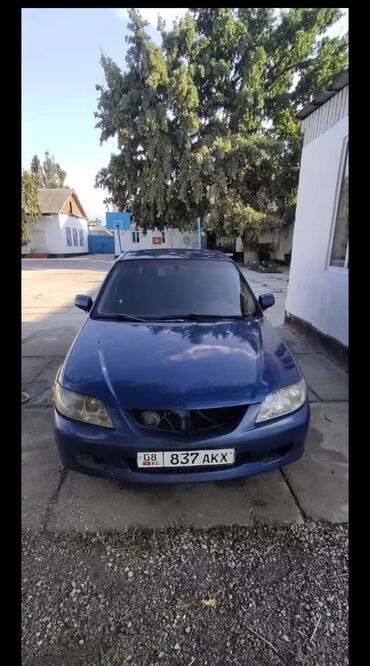 Mazda: Mazda 323: 2001 г., 2 л, Механика, Бензин, Хэтчбэк