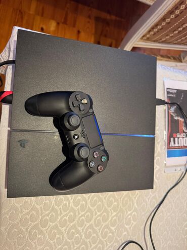 PS4 (Sony Playstation 4): Playstation 4 Fat model ideal veziyyetde icinde sekilde olan oyunlar