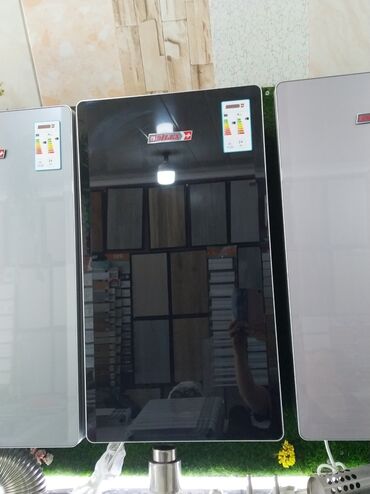 yemek qizdiran: Silaz markalı, düzbucaqlı formalı, qara rəngli su qızdırıcısı. Enerji