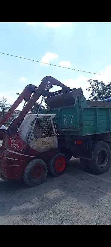 Услуги мини-погрузчика TCM (скид-стир) с ковшом - Погрузка и вывоз