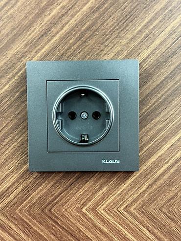 Выключатели: Настенные выключатели KLAUS, графитовый матовый цвет. Описание: - — 7