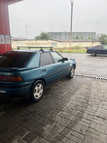 крыло на фит: Mazda 323: 1994 г., 1.3 л, Механика, Бензин, Хэтчбэк — 2