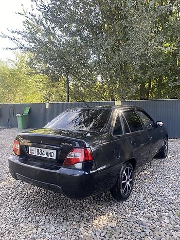 салон автомобиля: Daewoo Nexia: 2011 г., 1.5 л, Седан — 5
