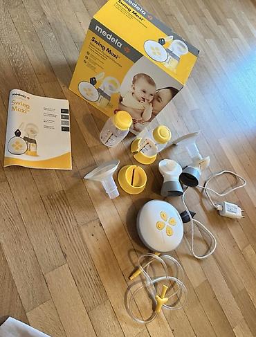 пл: Молокоотсос Medela Swing Maxi (двухфазная технология, двойное — 1