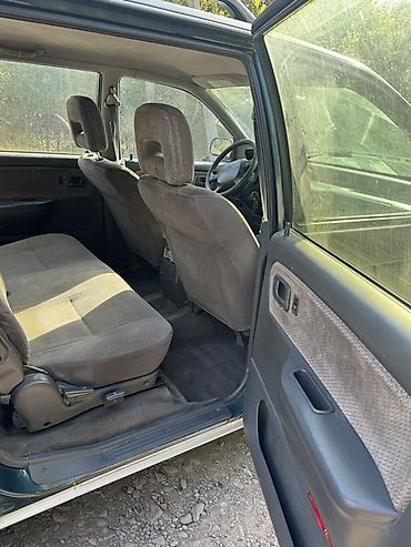 личным авто: Mitsubishi Space Wagon: 1996 г., 2 л, Механика, Бензин, Минивэн — 7