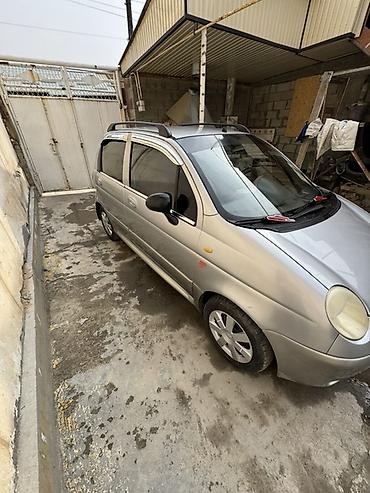 Другие автомобили: Компактный городской хэтчбек серебристого цвета. Характеристики и — 1