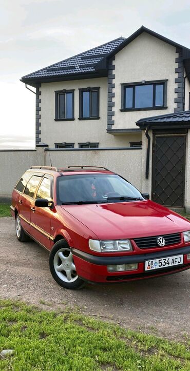 скупка генератора: Красный универсал Volkswagen Passat B4, объем 2 МОНО, 1995г.в