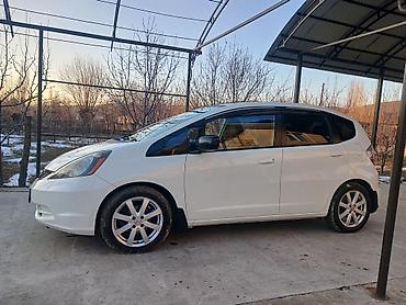 skoda rapid 2012: Honda Fit: 2010 г., 1.5 л, Автомат, Бензин, Хэтчбэк — 2