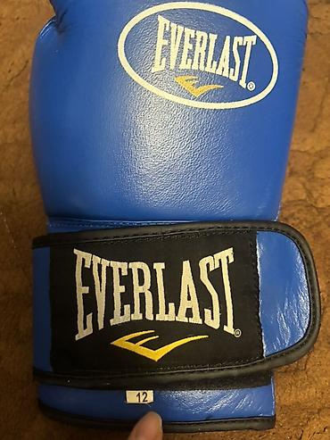 Перчатки: Боксерские перчатки Everlast, синий цвет. - Вес/размер: 12 oz — 5