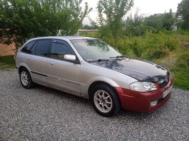 продаю кадиллак: Mazda 323: 1998 г., 1.6 л, Механика, Газ, Хэтчбэк