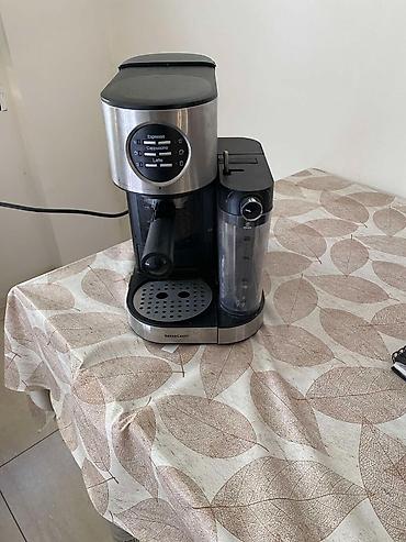 ajfon 9: Espresso kafe aparat sa posudom za mleko 
Upola cena kucno koriscen — 4
