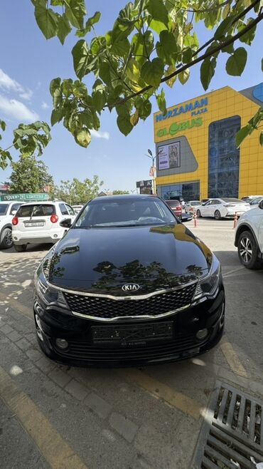 багажник на крышу авто бишкек: Чёрный седан Kia Optima. Автомобиль имеет характерную решётку