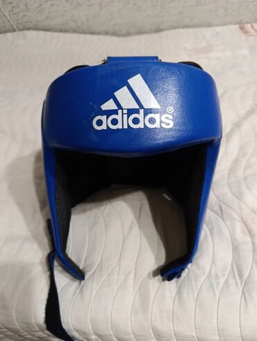 Шлемы: Боксерский шлем Adidas, синий цвет. Характеристики: - Размер: XL