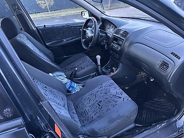 Mazda: Mazda 323: 2000 г., 1.8 л, Механика, Бензин, Универсал — 9