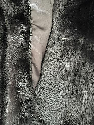 Шубы: Шуба из норки, черного цвета, с капюшоном. - Размер: 38 (44) - Длина — 10