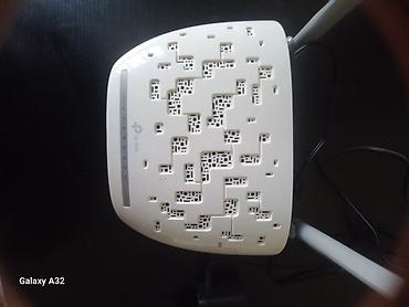Modemlər və şəbəkə avadanlıqları: Xiaomi Mi Wi‑Fi Router (4 antennali) + TP‑Link ADSL/VDSL modem-router — 5