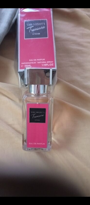eclat home sport: The Night's Treasure Intense ətrinin 35 ml-lik şüşəsi. Bu ətir, həm