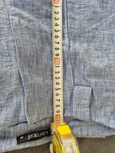 Kompleti: Dvodielni ženski komplet – prsluk/top + pantalone Odgovara veličini m — 14