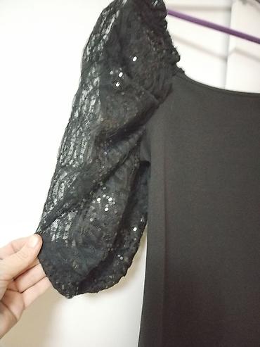baletanke devojcice: Elegantna crna haljina A‑kroja sa puf rukavima.Bel M moze i manji L — 2