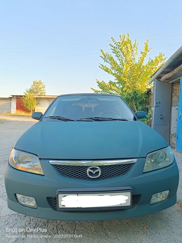 mazda demio транспорт: Mazda 323: 2002 г., 2 л, Механика, Дизель, Универсал