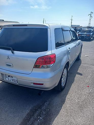 Mitsubishi: Mitsubishi Airtrek, gümüşü rəng, 5 qapılı krossover/gəzinti — 6