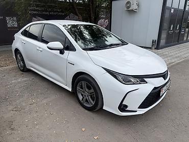Toyota Corolla: 2019 г., 1.8 л, Автомат, Гибрид, Седан