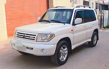 pajero tekeri: Mitsubishi Pajero iO 4WD – ağ rəngli, kompakt off-road SUV Maşına — 3