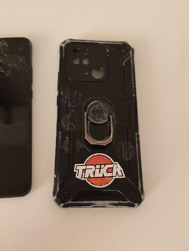 alcatel 9005x: Смартфон POCO (черный цвет). На задней панели — модуль основной камеры — 3