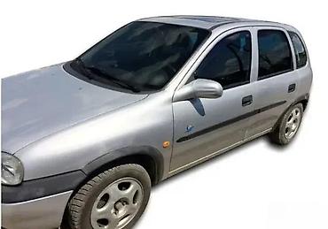 Ostali delovi karoserije: BOCNI VETROBRANI DEFLEKTORI USMERIVACI OPEL CORSA B (93-01) | NOVI — 2