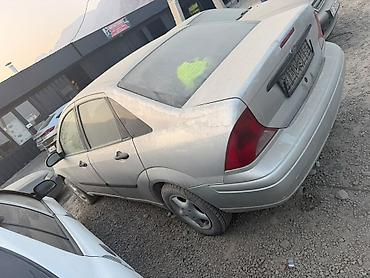 тоето корола: Ford Focus, седан, серебристого цвета. мотор кылыш керек Автомобиль — 4