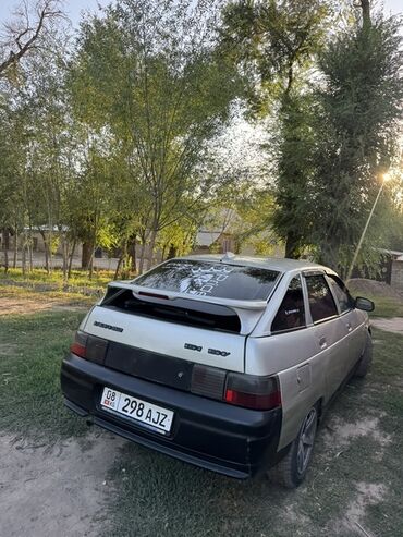 авто обмен участок: Автомобиль ВАЗ-2112 серого цвета, пятидверный хэтчбек, оснащенный