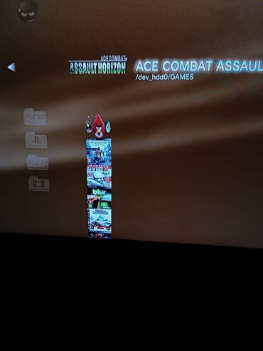 PS3 (Sony PlayStation 3): Sony PlayStation 3 Super Slim konzola (top‑loader) sa kamuflažnim — 2