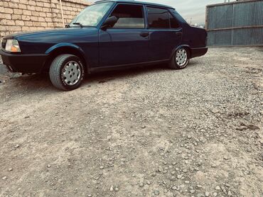 Tofas: Model: Tofas Şahin (sedan) Kuzov: 4 qapı, mavi rəng Yanacaq: Benzin -da lalafo.az — 6 Tofas: Model: Tofas Şahin (sedan) Kuzov: 4 qapı, mavi rəng Yanacaq: Benzin — 6