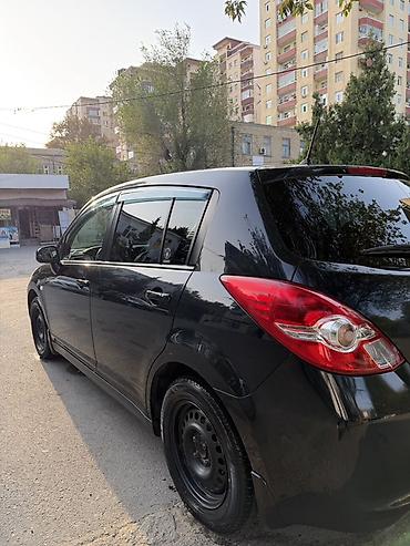 mini cooper 2009: Nissan Tiida hetçbek kuzovlu Qadin surub Cox ekonomik masindi ! — 7
