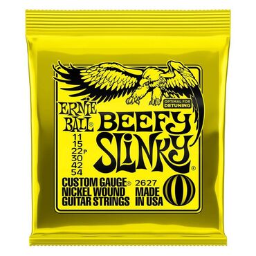 купить музыкальные инструменты бу: Продам струны Ernie Ball Beefy Slinky 2627 (11-54) Комплект струн для