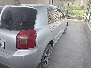 тойота королла е120: Toyota Corolla: 2002 г., Хэтчбэк — 6