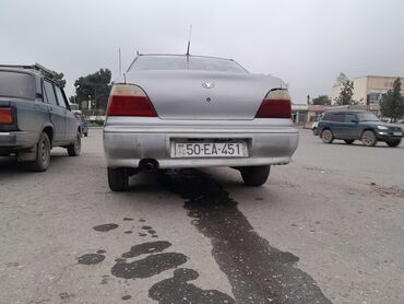 Daewoo: Daewoo Nexia sedan - Kuzov: 4 qapılı sedan, gümüşü rəng - Nömrə: AZ — 2