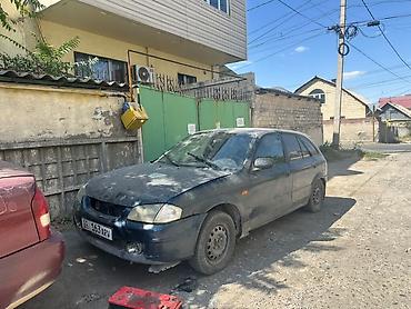 wagon: Mazda 323: 2000 г., 1.6 л, Механика, Бензин, Универсал — 1