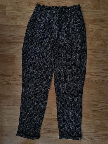 torba givenchy: Ženske pantalone u tamno sivoj boji, sa diskretnim dezenom riblje — 1