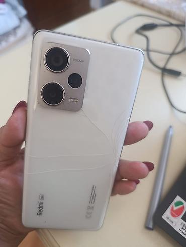 telefolar: Xiaomi 12 Pro, 
 İki sim kartlı — 5