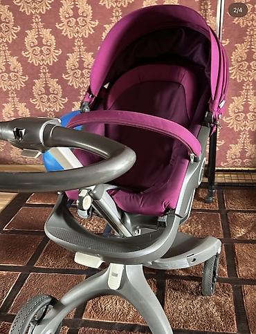 baş ortusu: Uşaq arabası – Stokke Xplory (bənövşəyi rəng) Xüsusiyyətlər: - Yüksək — 4