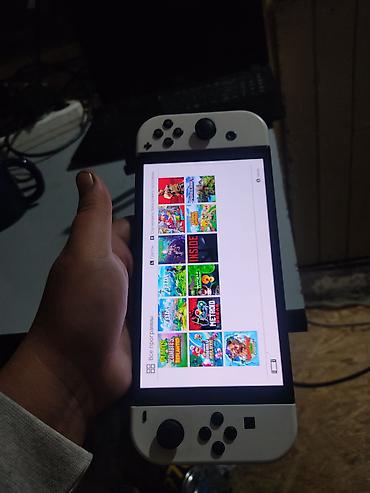 Nintendo Switch OLED: Nintendo Switch oled чипованная (прошитая) встроенная память 32гб+64гб — 6