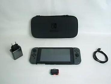 Nintendo Switch: Uz konzolu dolazi: Tablet (konzola) Joy-Con džojstici Punjač — 16