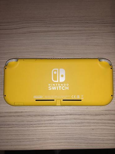 nintendo lite: Nintendo Switch Lite (Yellow) + Original Adapter Vəziyyəti: Yaxşı — 3