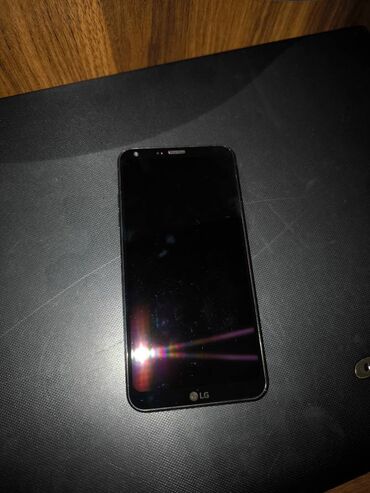 satılan telefonlar: LG Q6, 32 GB, rəng - Qara, İki sim kartlı