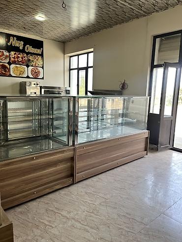Soyuducu vitrinləri: Soyuducu vitrin + kassa şkafı Çox az istifadə edilib. Yeni kimidir — 7